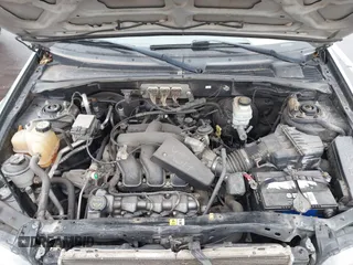 2006 Ford Escape XLT with VIN 1FMYU03126KC55897, listed as a IAAI auction lot 41733243 with 136,989 mi miles. Bid and sale history available at carsss.com. Image 10.