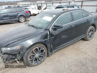2013 Ford Taurus SHO z VIN 1FAHP2KT6DG174191, wystawiony jako IAAI lot #41752293 z przebiegiem 147 607 mil mil oraz . Historia ofert i sprzedaży dostępna na DreamBid. Obrazek 2.