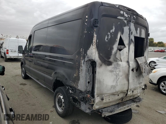 2024 Ford Transit Cargo with VIN 1FTBR1C86RKA98779, listed as a Copart auction lot 70473944 with 35 mi miles and Salvage Title. Bid and sale history available at DreamBid. Image 2.