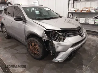 2016 Toyota RAV4 LE with VIN 2T3BFREV7GW450556, listed as a IAAI auction lot 41815720 with 106,734 mi miles. Bid and sale history available at carsss.com. Image 6.