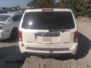 2012 Honda Pilot Touring with VIN 5FNYF3H92CB027292, listed as a IAAI auction lot 40617936 with 140,455 mi miles and . Bid and sale history available at carsss.com. Image 16.