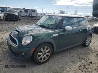2011 MINI Hardtop S with VIN WMWSV3C55BTY24299, listed as a Copart auction lot 54725755 with 82,489 mi miles and Salvage Title. Bid and sale history available at DreamBid. Image 1.