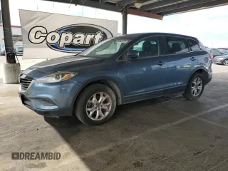 2015 Mazda CX-9 Touring z VIN JM3TB3CV2F0467257, wystawiony jako Copart lot #55896725 z przebiegiem 146 877 mil mil oraz Czysty tytuł • Clean title. Historia ofert i sprzedaży dostępna na DreamBid. Obrazek 1.