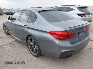 2018 BMW 5 Series M550i xDrive with VIN WBAJB9C55JB035694, listed as a IAAI auction lot 42122730 with 61,561 mi miles and . Bid and sale history available at DreamBid. Image 3.