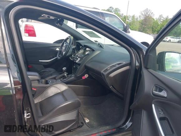 2014 Ford Focus ST with VIN 1FADP3L98EL269058, listed as a IAAI auction lot 42169021 with 106,325 mi miles and . Bid and sale history available at carsss.com. Image 5.