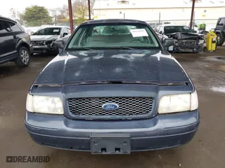 2001 Ford Crown Victoria Police Pkg Police Interceptor with VIN 2FAFP71WX1X127347, listed as a IAAI auction lot 41134745 with 161,180 mi miles. Bid and sale history available at carsss.com. Image 12.
