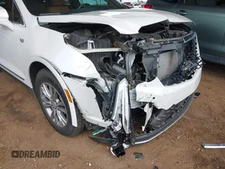 2021 Cadillac XT5 FWD Premium Luxury with VIN 1GYKNCRS5MZ224957, listed as a IAAI auction lot 41794648 with 28,540 mi miles and . Bid and sale history available at carsss.com. Image 6.