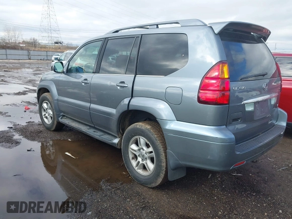 2003 Lexus GX with VIN JTJBT20X830006106, listed as a IAAI auction lot 41520749 with 264,413 mi miles. Bid and sale history available at carsss.com. Image 3.