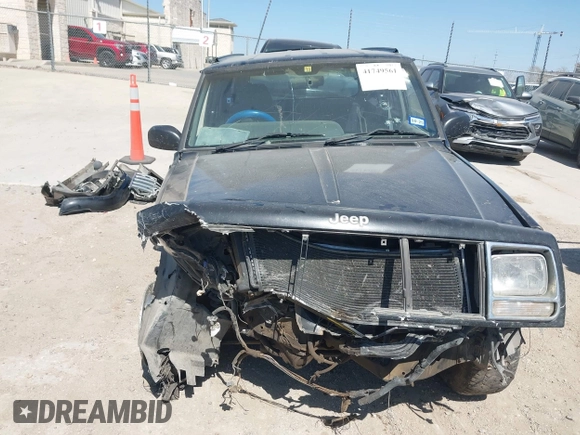1999 Jeep Cherokee with VIN 1J4FN68S4WL268314, listed as a IAAI auction lot 41749561 with Not provided miles and . Bid and sale history available at DreamBid. Image 13.
