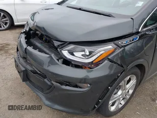 2021 Chevrolet Bolt EV LT z VIN 1G1FY6S0XM4108670, wystawiony jako IAAI lot #41625671 z przebiegiem 20 859 mil mil oraz . Historia ofert i sprzedaży dostępna na DreamBid. Obrazek 19.
