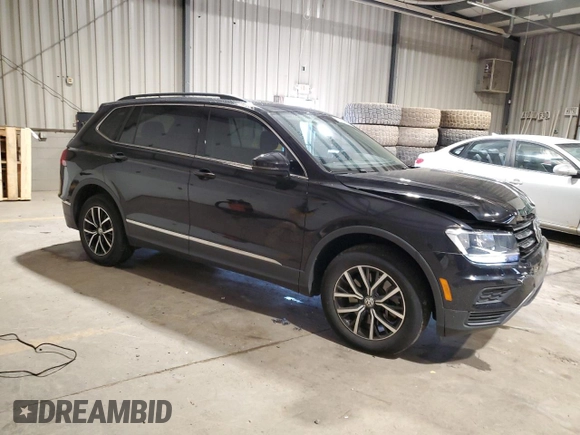 2021 Volkswagen Tiguan SE with VIN 3VV2B7AXXMM071024, listed as a Copart auction lot 52243675 with 31,448 mi miles and Salvage Title. Bid and sale history available at DreamBid. Image 4.