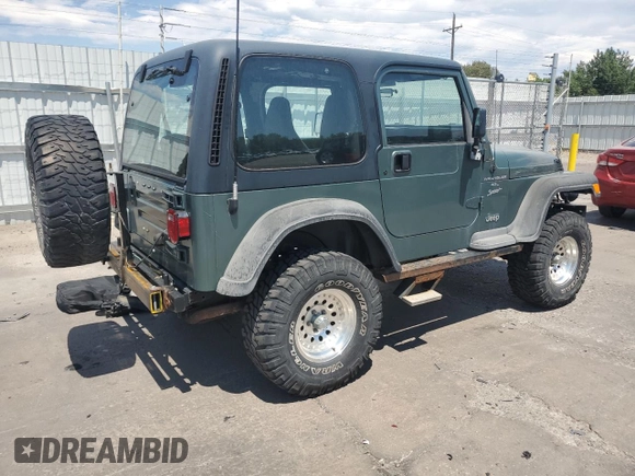 2000 Jeep Wrangler Sport с VIN 1J4FA49S4YP710633, выставлен на аукционе Copart как лот 65095875 с пробегом 107 613 миль миль и Чистый • Clean title. История ставок и продаж доступна на DreamBid. Изображение 3.