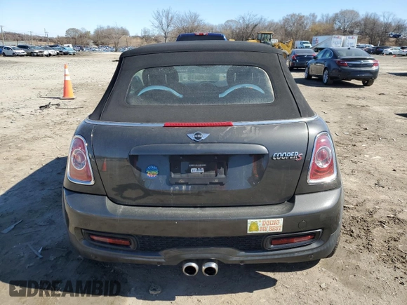 2015 MINI Convertible S z VIN WMWZP3C52FT708928, wystawiony jako Copart lot #49580345 z przebiegiem 62 342 mil mil oraz Czysty tytuł • Clean title. Historia ofert i sprzedaży dostępna na DreamBid. Obrazek 6.