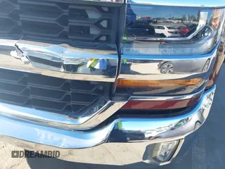 2017 Chevrolet Silverado 1500 LT with VIN 1GCRCREC0HZ171084, listed as a IAAI auction lot 40142848 with 137,420 mi miles and . Bid and sale history available at DreamBid. Image 6.