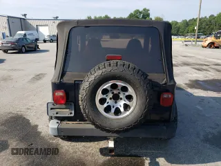 1997 Jeep Wrangler SE z VIN 1J4FY29PXVP464548, wystawiony jako Copart lot #59430535 z przebiegiem 183 412 mil mil oraz Czysty tytuł • Clean title. Historia ofert i sprzedaży dostępna na DreamBid. Obrazek 6.