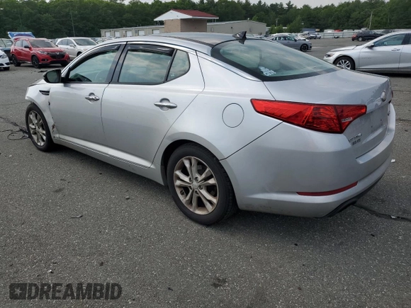 2013 Kia Optima EX z VIN 5XXGN4A79DG217554, wystawiony jako Copart lot #59667065 z przebiegiem 102 482 mil mil oraz Szkoda całkowita • Salvage title. Historia ofert i sprzedaży dostępna na DreamBid. Obrazek 2.