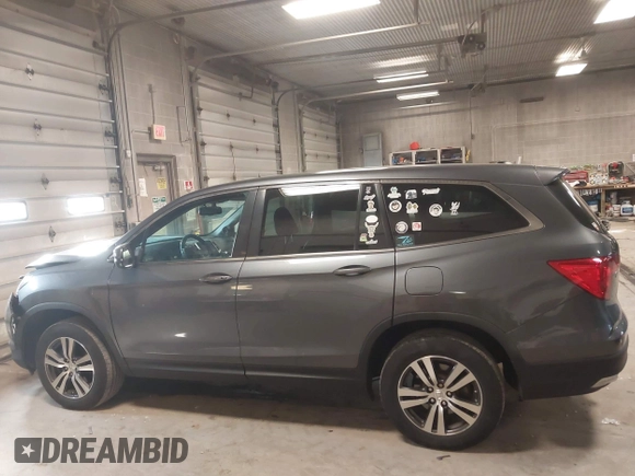 2016 Honda Pilot EX-L with VIN 5FNYF6H51GB097323, listed as a IAAI auction lot 41989978 with 105,006 mi miles. Bid and sale history available at carsss.com. Image 14.