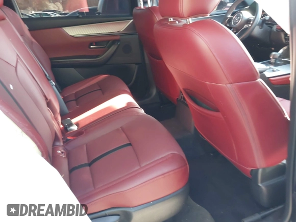 2025 Mazda CX-70 S Premium with VIN JM3KJDHC8S1102288, listed as a IAAI auction lot 41994535 with 2,122 mi miles and . Bid and sale history available at DreamBid. Image 8.