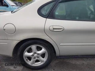 2003 Ford Taurus SES Standard with VIN 1FAFP55U43A140202, listed as a IAAI auction lot 41994960 with 90,650 mi miles. Bid and sale history available at carsss.com. Image 14.