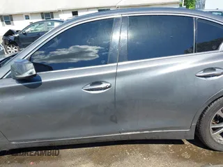 2015 Infiniti Q50 Premium with VIN JN1BV7AR7FM409374, listed as a IAAI auction lot 42202230 with 79,453 mi miles and . Bid and sale history available at DreamBid. Image 14.