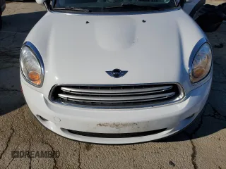 2016 MINI Countryman with VIN WMWZB3C58GWM33239, listed as a Copart auction lot 89364605 with 152,358 mi miles and Salvage title. Bid and sale history available at DreamBid. Image 11.