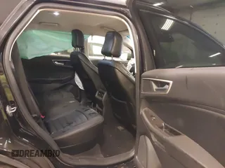 2020 Ford Edge SEL z VIN 2FMPK4J95LBA90533, wystawiony jako IAAI lot #42151916 z przebiegiem 57 197 mil mil oraz . Historia ofert i sprzedaży dostępna na DreamBid. Obrazek 8.