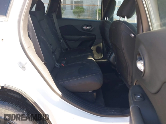 2015 Jeep Cherokee Latitude with VIN 1C4PJMCS0FW790017, listed as a IAAI auction lot 42097988 with 105,990 mi miles and . Bid and sale history available at DreamBid. Image 8.