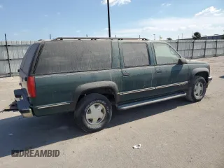 1998 GMC Suburban z VIN 3GKFK16R1WG511256, wystawiony jako Copart lot #77568484 z przebiegiem 301 116 mil mil oraz Czysty tytuł • Clean title. Historia ofert i sprzedaży dostępna na DreamBid. Obrazek 3.