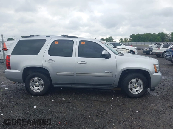 2012 Chevrolet Tahoe LS z VIN 1GNSCAE02CR308972, wystawiony jako IAAI lot #42495520 z przebiegiem 205 295 mil mil oraz . Historia ofert i sprzedaży dostępna na DreamBid. Obrazek 13.