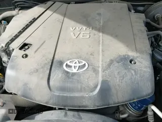 2014 Toyota Tacoma with VIN 3TMLU4EN0EM148389, listed as a IAAI auction lot 41490721 with 119,731 mi miles and . Bid and sale history available at DreamBid. Image 19.