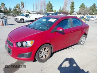 2013 Chevrolet Sonic LT with VIN 1G1JC5SB2D4115715, listed as a IAAI auction lot 41870815 with 137,786 mi miles and . Bid and sale history available at DreamBid. Image 2.