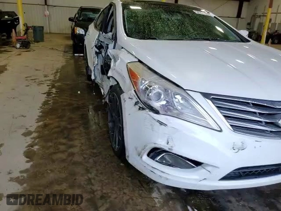 2013 Hyundai Azera z VIN KMHFH4JG0DA225049, wystawiony jako Copart lot #65530604 z przebiegiem 77 218 mil mil oraz Szkoda całkowita • Salvage title. Historia ofert i sprzedaży dostępna na DreamBid. Obrazek 10.