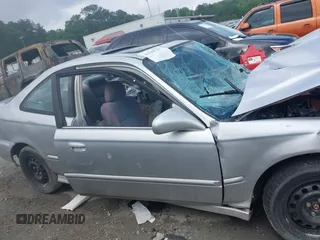 1998 Honda Civic EX z VIN 1HGEJ8244WL035537, wystawiony jako IAAI lot #42288787 z przebiegiem 222 781 mil mil oraz . Historia ofert i sprzedaży dostępna na DreamBid. Obrazek 12.