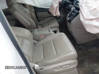 2012 Honda Odyssey EX-L with VIN 5FNRL5H67CB082903, listed as a IAAI auction lot 42015904 with 208,300 mi miles and . Bid and sale history available at carsss.com. Image 5.