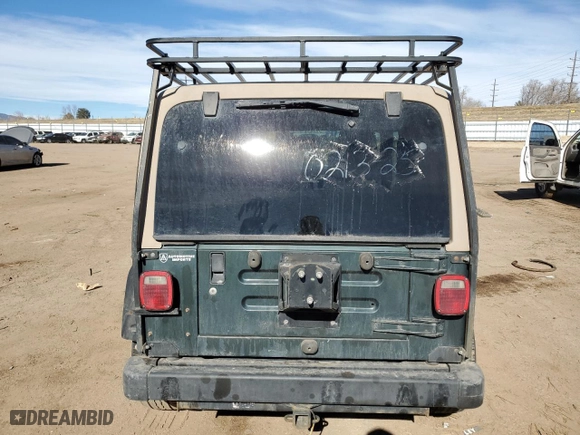 2004 Jeep Wrangler Sport with VIN 1J4FA49S24P752406, listed as a Copart auction lot 42060685 with 139,457 mi miles and Salvage Title. Bid and sale history available at carsss.com. Image 6.