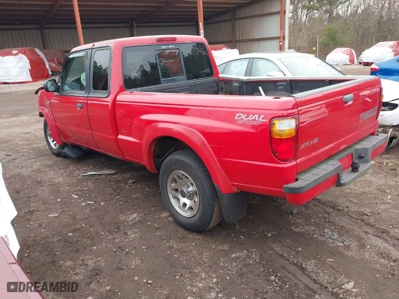2001 Mazda B-Series 2WD Truck DS with VIN 4F4YR16U01TM15304, listed as a IAAI auction lot 41339885 with 122,987 mi miles. Bid and sale history available at carsss.com. Image 3.