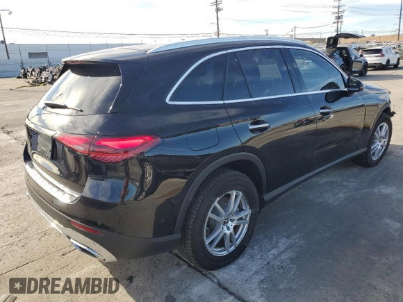 2023 Mercedes-Benz GLC with VIN W1NKM4GB4PU017214, listed as a Copart auction lot 87627235 with 8,678 mi miles and Salvage Title. Bid and sale history available at carsss.com. Image 3.