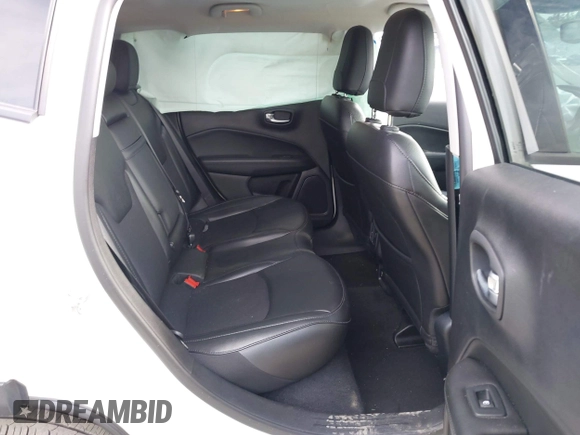 2019 Jeep Compass Latitude with VIN 3C4NJCBB0KT677025, listed as a IAAI auction lot 42574952 with 53,681 mi miles and . Bid and sale history available at DreamBid. Image 8.
