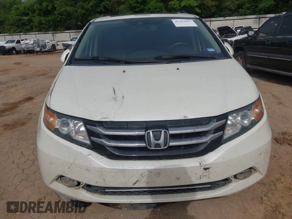 2015 Honda Odyssey Touring Elite with VIN 5FNRL5H96FB045968, listed as a IAAI auction lot 42263637 with 207,637 mi miles and . Bid and sale history available at DreamBid. Image 6.
