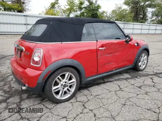 2011 MINI Convertible with VIN WMWZN3C51BTZ78331, listed as a Copart auction lot 73348304 with 94,219 mi miles and Salvage title. Bid and sale history available at DreamBid. Image 3.
