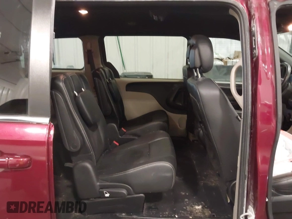 2019 Dodge Grand Caravan SXT with VIN 2C4RDGCG9KR678235, listed as a IAAI auction lot 41864931 with 127,848 mi miles and . Bid and sale history available at DreamBid. Image 8.
