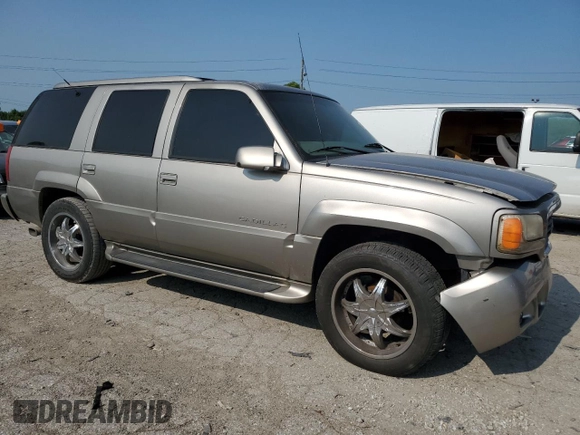 2000 Cadillac Escalade z VIN 1GYEK63R2YR210601, wystawiony jako Copart lot #64108944 z przebiegiem 186 964 mil mil oraz Szkoda całkowita • Salvage title. Historia ofert i sprzedaży dostępna na DreamBid. Obrazek 4.
