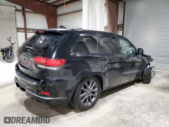 2018 Jeep Grand Cherokee Overland with VIN 1C4RJFCG1JC287784, listed as a Copart auction lot 50391255 with 105,981 mi miles and Salvage title. Bid and sale history available at DreamBid. Image 3.