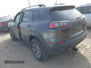 2022 Jeep Cherokee Trailhawk with VIN 1C4PJMBX4ND536592, listed as a IAAI auction lot 41792322 with 43,611 mi miles and . Bid and sale history available at DreamBid. Image 3.