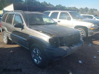 2004 Jeep Grand Cherokee Laredo with VIN 1J4GX48S44C394429, listed as a IAAI auction lot 41802203 with 144,925 mi miles. Bid and sale history available at carsss.com. Image 1.