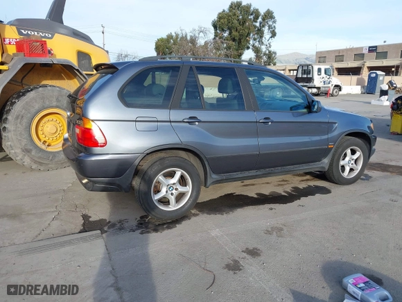 2003 BMW X5 3.0i with VIN 5UXFA53573LV83812, listed as a IAAI auction lot 41590046 with 166,841 mi miles. Bid and sale history available at carsss.com. Image 4.