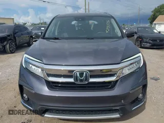 2022 Honda Pilot Elite with VIN 5FNYF6H04NB025212, listed as a IAAI auction lot 42430032 with 69,427 mi miles and . Bid and sale history available at DreamBid. Image 12.