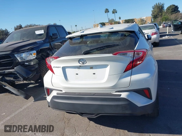 2019 Toyota C-HR XLE with VIN JTNKHMBX4K1058916, listed as a IAAI auction lot 41296963 with 113,290 mi miles. Bid and sale history available at carsss.com. Image 16.