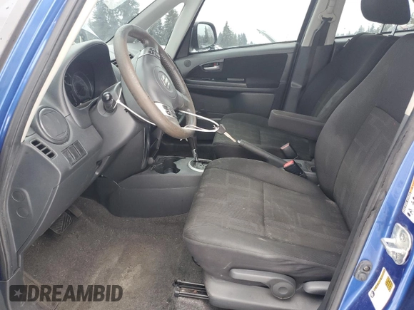 2012 Suzuki SX4 LE z VIN JS2YC5A30C6305375, wystawiony jako Copart lot #45429185 z przebiegiem 103 283 mil mil oraz Szkoda całkowita • Salvage title. Historia ofert i sprzedaży dostępna na DreamBid. Obrazek 7.
