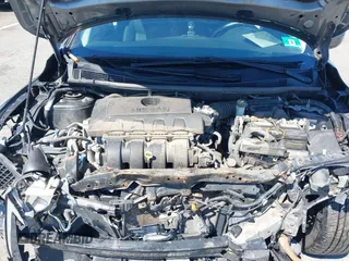 2018 Nissan Sentra SV with VIN 3N1AB7AP3JL633148, listed as a IAAI auction lot 41983588 with 148,479 mi miles and . Bid and sale history available at DreamBid. Image 10.